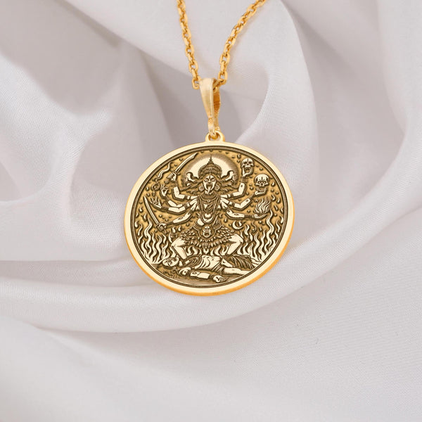 14K solid gold Kali Mata amulet, a powerful talisman for protection, symbolizing strength and divine transformation.