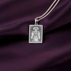A striking 925 sterling silver tarot card pendant of the Japanese goddess Amaterasu. This piece of spiritual jewelry shows the goddess of light radiating warmth, a design inspired by the sacred Ise Grand Shrine.