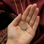 MahaKali Yantra rose gold pendant - back detail showing hand