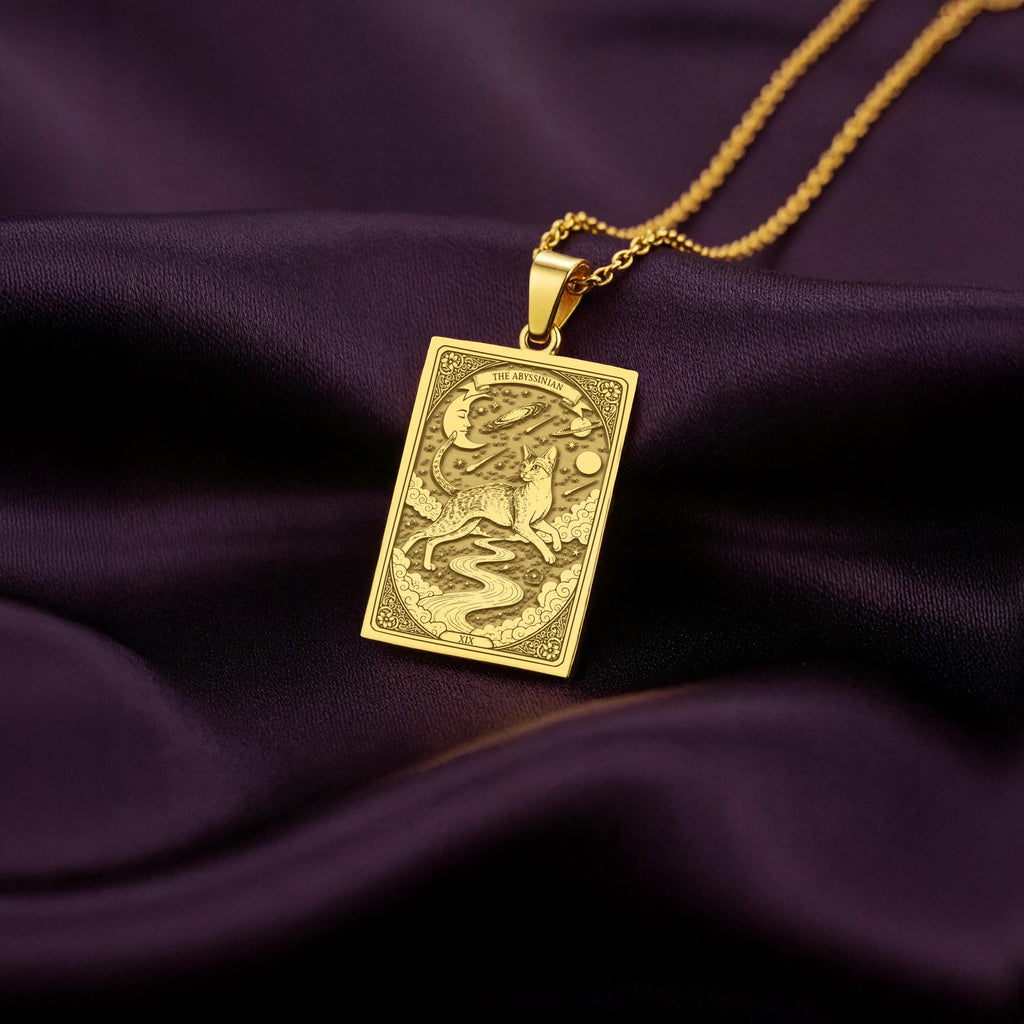 A polished 14K solid gold Portuguese Water Dog medallion. This fine pet jewelry represents the breed's joyful spirit, making it a perfect PWD lover gift.