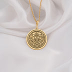 14K Solid Gold Gemini Zodiac Medallion featuring celestial twins with astrological symbols. Detailed birth sign talisman with mirror figures, swords and symbolic elements. Luxury star sign jewelry gift symbolizing duality and communication.
