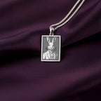 A striking 925 sterling silver tarot card pendant of a Victorian rabbit. This piece of whimsical jewelry is inspired by characters like the White Rabbit from Alice in Wonderland.