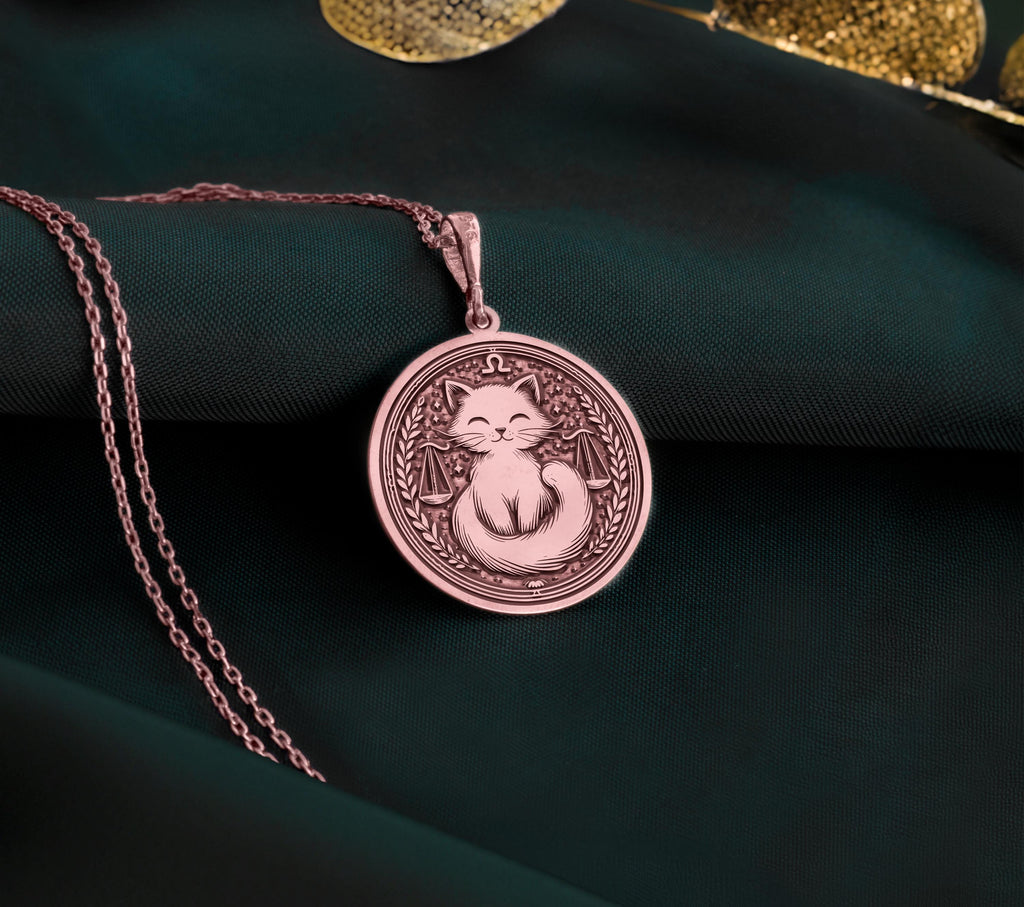 Libra Scales Zodiac Pendant Necklaces Rose 14K Rose 14K 14K Rose 14K 14K Rose Gold Plated pendant necklace featuring a sleeping cat face design on a round disc.