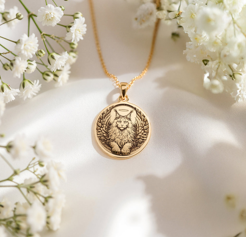 14K Gold Plated Maine Coon Angel Cat Medallion with memorial symbolism. Detailed large cat breed angel pendant with wings, halo and radiant elements. Elegant rainbow bridge jewelry gift representing eternal bond with departed gentle giant companion.