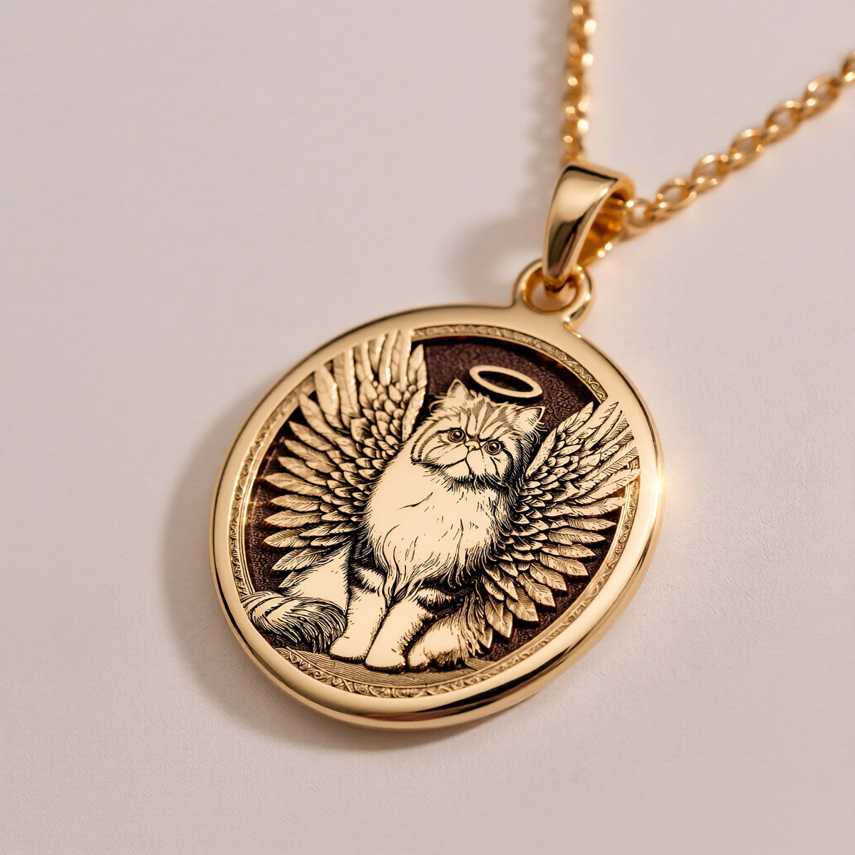 Rose Gold Plated Persian Cat Angel Pendant with memorial design. Warm-toned long-haired breed medallion with detailed wings, halo and characteristic flat face. Rainbow bridge jewelry celebrating eternal love, perfect for grieving Persian parents.