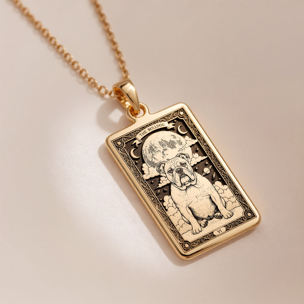 An heirloom-quality 14K solid gold Bulldog tarot pendant. The art shows the loyal dog under the moon, symbolizing companionship, a precious dog mom gift.