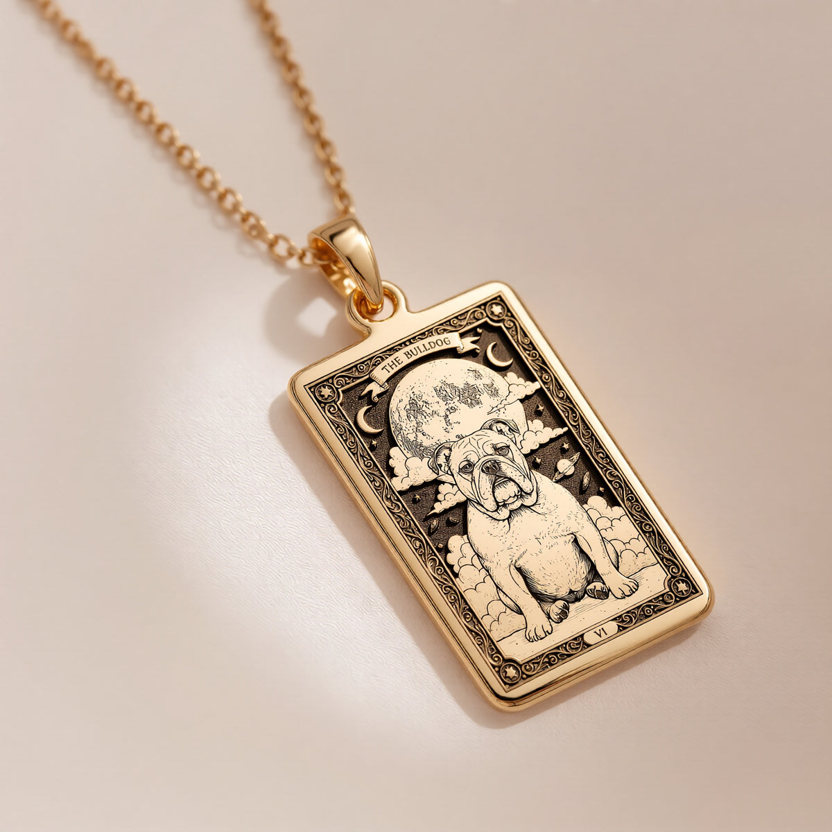 An heirloom-quality 14K solid gold Bulldog tarot pendant. The art shows the loyal dog under the moon, symbolizing companionship, a precious dog mom gift.