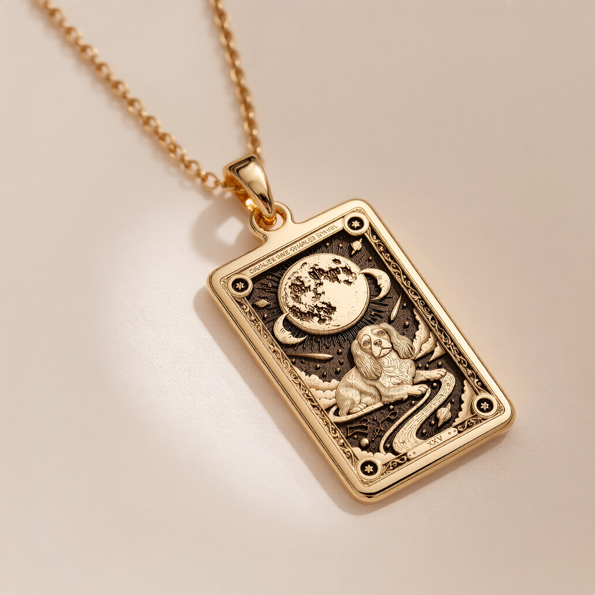 An heirloom-quality 14K solid gold Cavalier King Charles tarot pendant. The art shows the elegant dog, symbolizing grace, a precious dog mom gift.