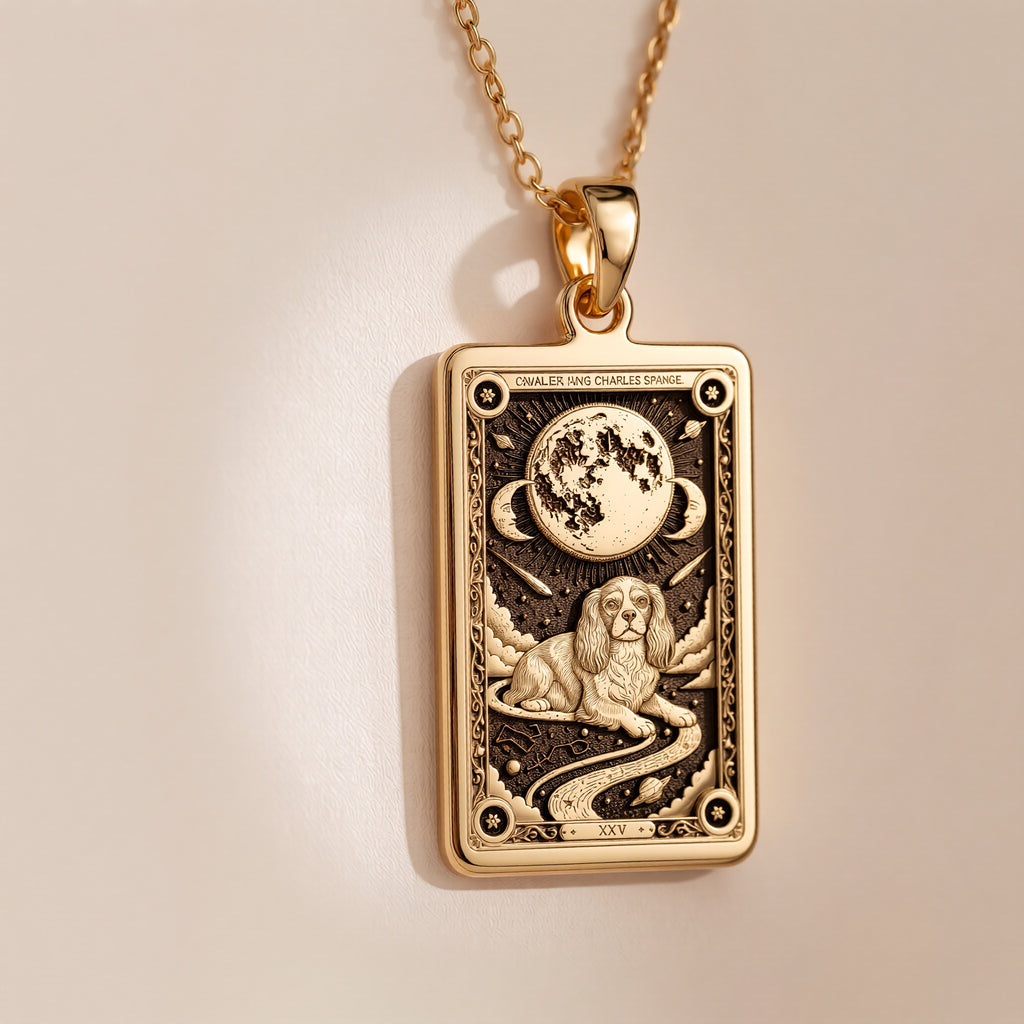 An heirloom-quality 14K solid gold Cavalier King Charles tarot pendant. The art shows the elegant dog, symbolizing grace, a precious dog mom gift.