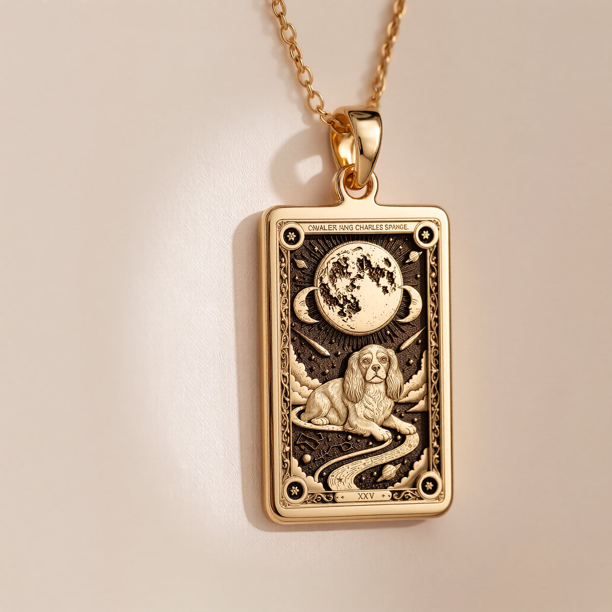 An heirloom-quality 14K solid gold Cavalier King Charles tarot pendant. The art shows the elegant dog, symbolizing grace, a precious dog mom gift.