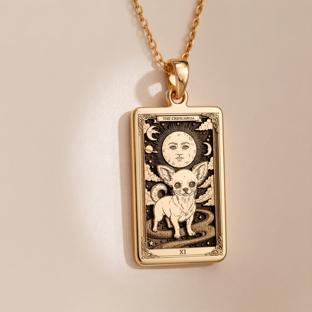 An heirloom-quality 14K solid gold Chihuahua tarot pendant. The art shows the tiny dog in a "Sun" card, symbolizing a big personality, a precious dog mom gift.