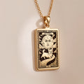 An heirloom-quality 14K solid gold Corgi tarot pendant. The art shows the whimsical dog under a moon, symbolizing a playful spirit, a precious dog mom gift.