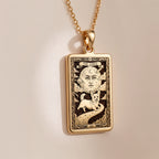 An heirloom-quality 14K solid gold Corgi tarot pendant. The art shows the whimsical dog under a moon, symbolizing a playful spirit, a precious dog mom gift.