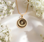 Crescent Moon Celestial Pendant Necklaces 14K 14K Gold Plated round pendant necklace featuring a crescent moon and sunburst design.