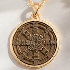 14K solid gold Dharma Wheel Spoked Talisman Necklace: round  of Buddhist Dharma wheel s...