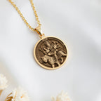 14K solid gold Durga Warrior Ten Arms Pendant: round  of Hindu goddess Durga warrior wi...