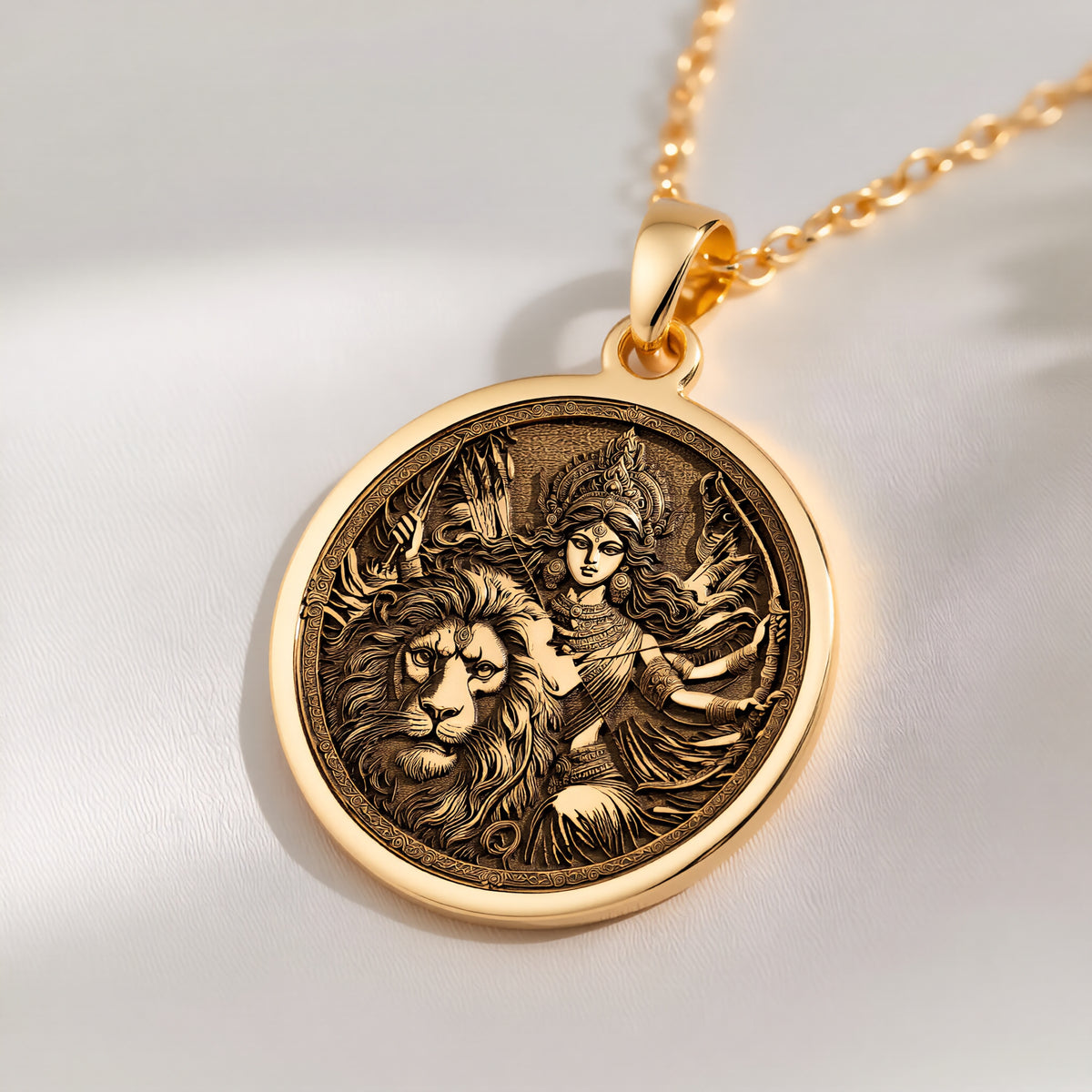 14K solid gold Durga Warrior Goddess Pendant: round  of Hindu goddess Durga warrior dei...