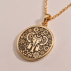 14K solid gold Ganesha Elephant God Pendant: round  of Ganesha Hindu elephant god with ...