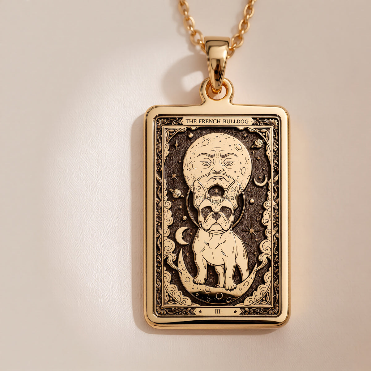 A polished 14K solid gold French Bulldog medallion. This fine pet jewelry represents the breed's loving nature, making it a perfect Frenchie lover gift.