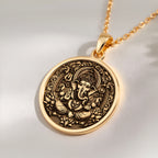 14K solid gold Ganesha Elephant God Pendant: round  of Hindu deity Ganesha with engrave...
