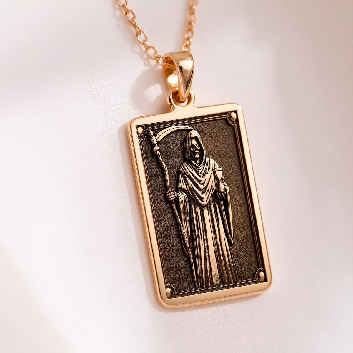 14K solid gold Grim Reaper pendant necklace. Gothic horror memento mori occult jewelry with a dark aesthetic.