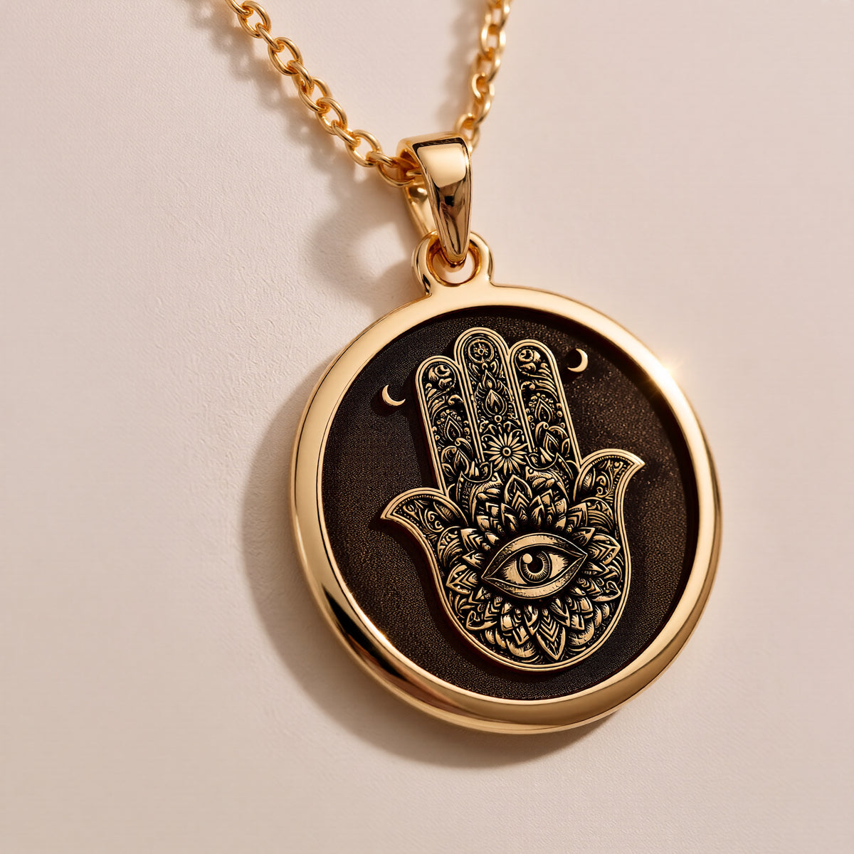 gold-plated Hamsa Hand pendant, detailed view 2.