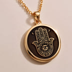 Hamsa Hand Protection Amulet Necklaces 925 925 Sterling Silver evil eye pendant necklace with round shape and detailed engraving.