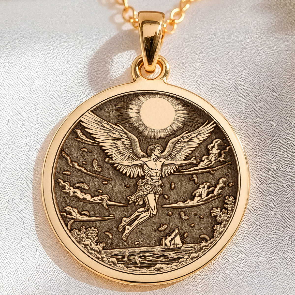 Icarus Melting Wings Pendant Necklaces 14K 14K Gold Plated pendant featuring a winged angel flying over water with a sun illustration.
