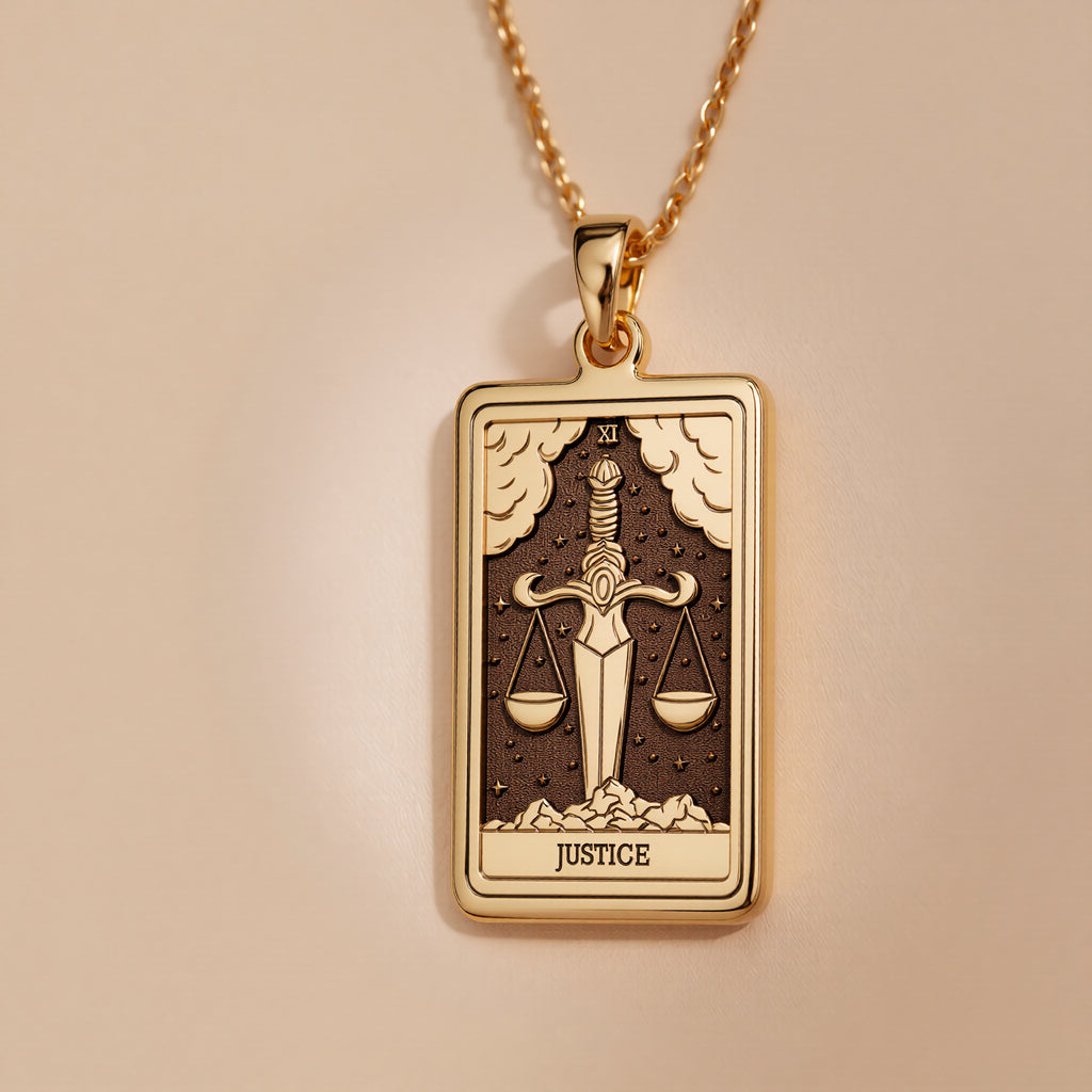 Justice Tarot Major Arcana Pendant Necklaces 14K 14K Gold Plated-toned pendant necklace featuring a square scales of justice design with the word JUSTICE.
