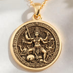 Kali Ma Hindu Goddess Coin Pendant Necklaces 14K 14K Gold Plated pendant featuring a deity figure surrounded by skulls and intricate details.