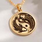 14K solid gold Koi Fish Talisman Necklace: round  two koi fish swimming in a yin yang c...