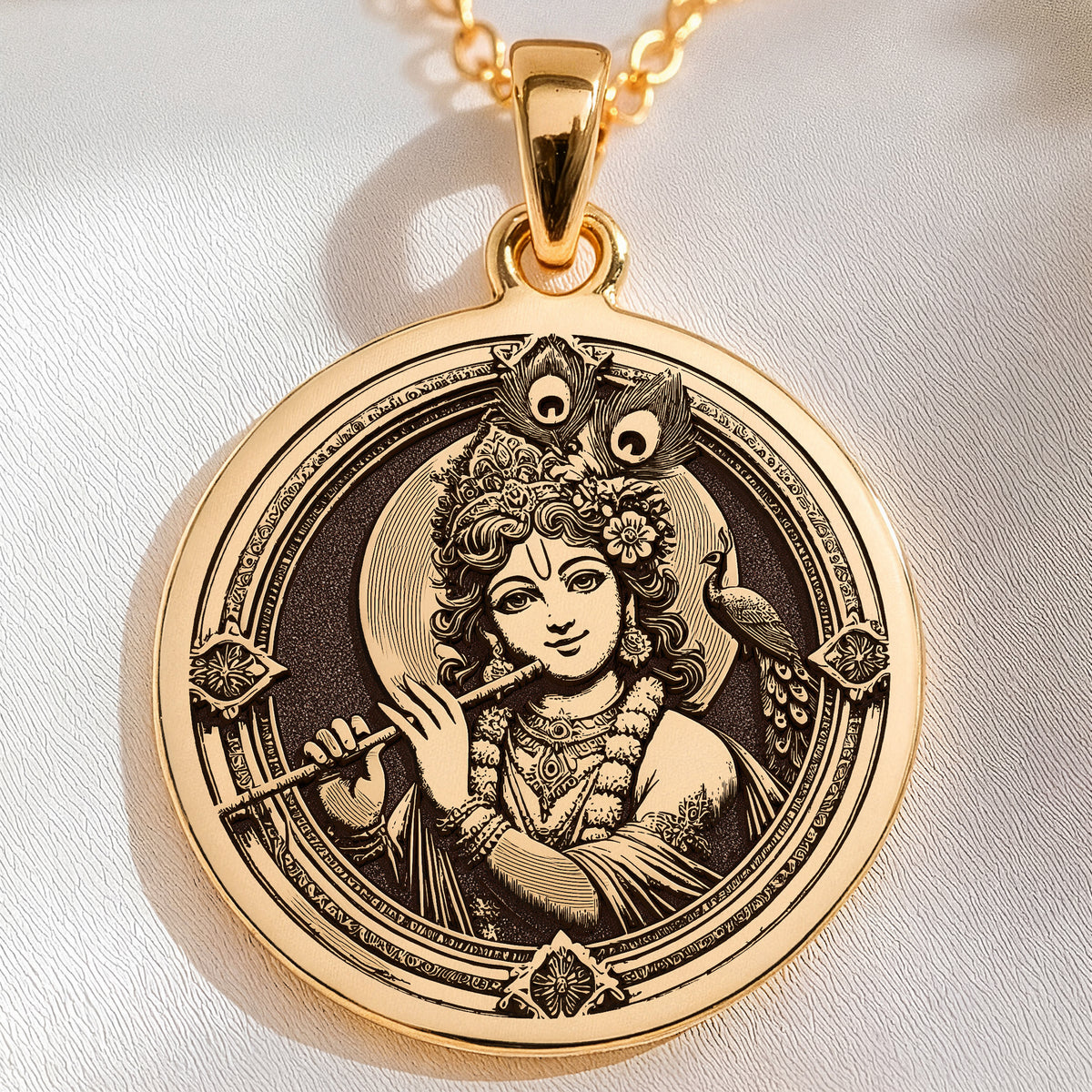 Krishna Amulet Hindu Pendant Necklaces 14K 14K Gold Plated pendant necklace featuring an engraved portrait with peacock design and floral elements.