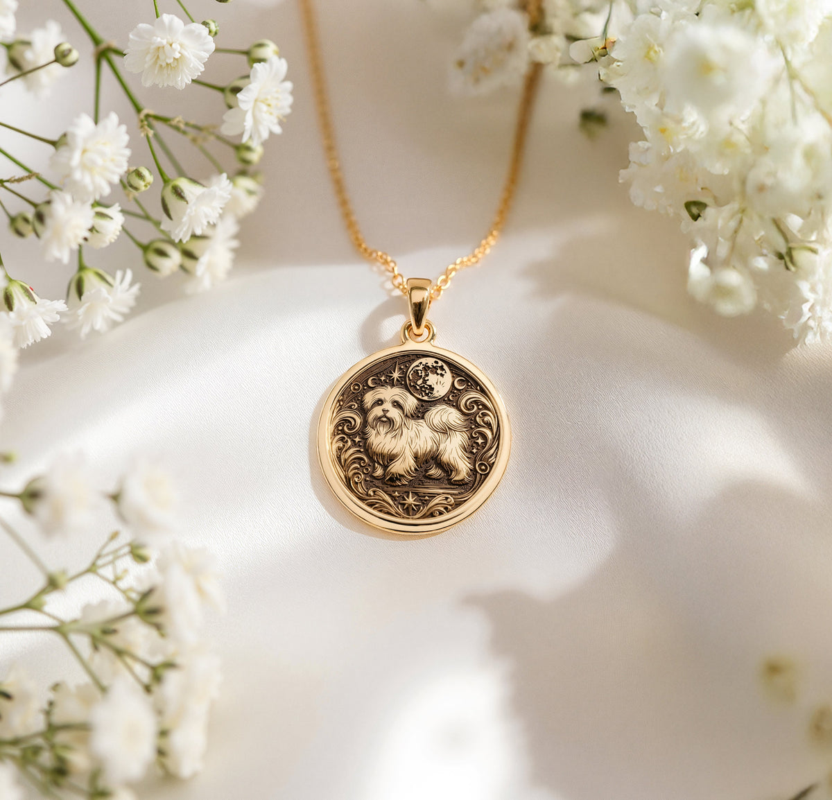 A polished 14K solid gold Maltese medallion. This fine pet jewelry represents the breed's cheerful spirit, making it a perfect Maltese lover gift.