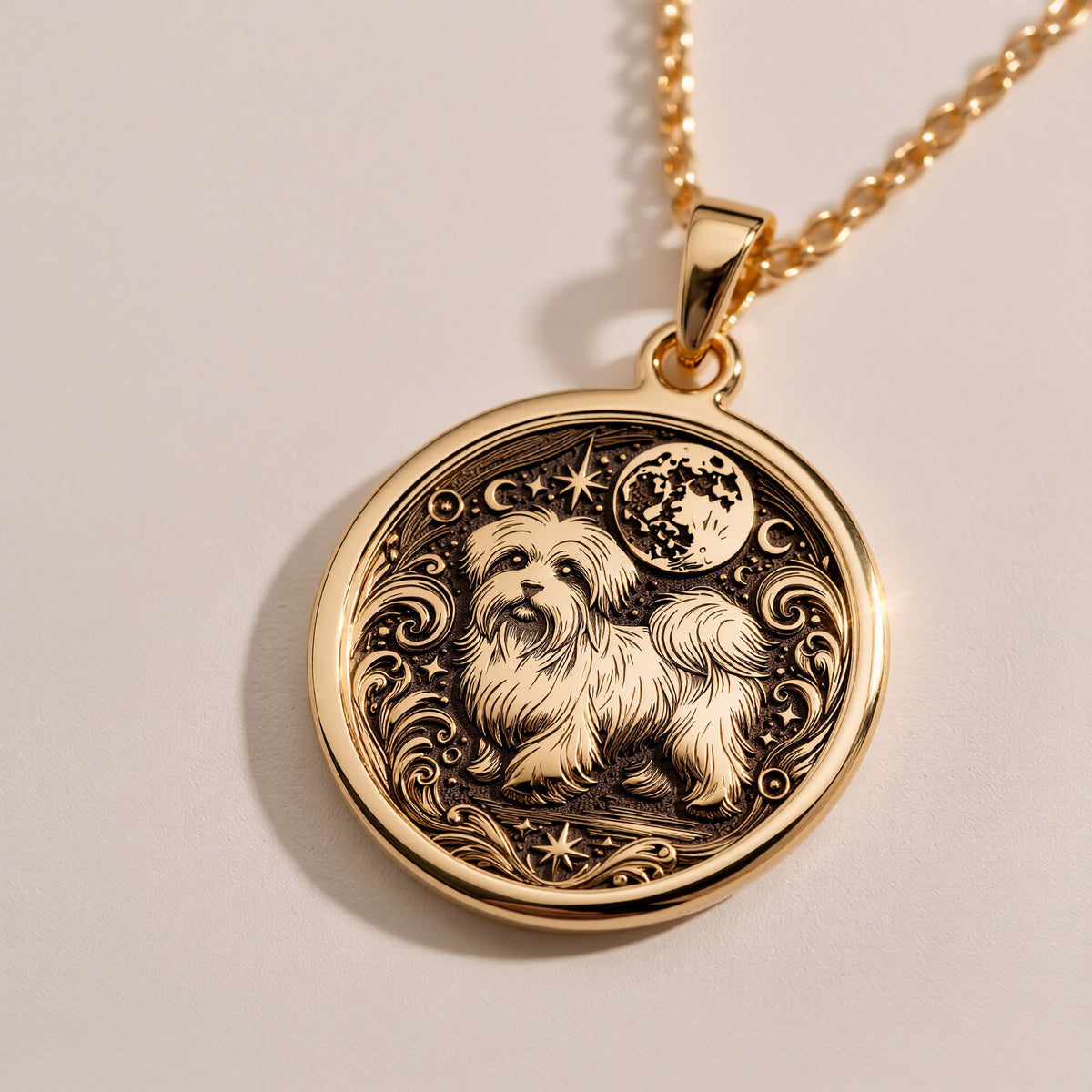 An elegant rose gold plated Maltese pendant. The beautiful engraving makes this a dainty and modern piece of pet jewelry.