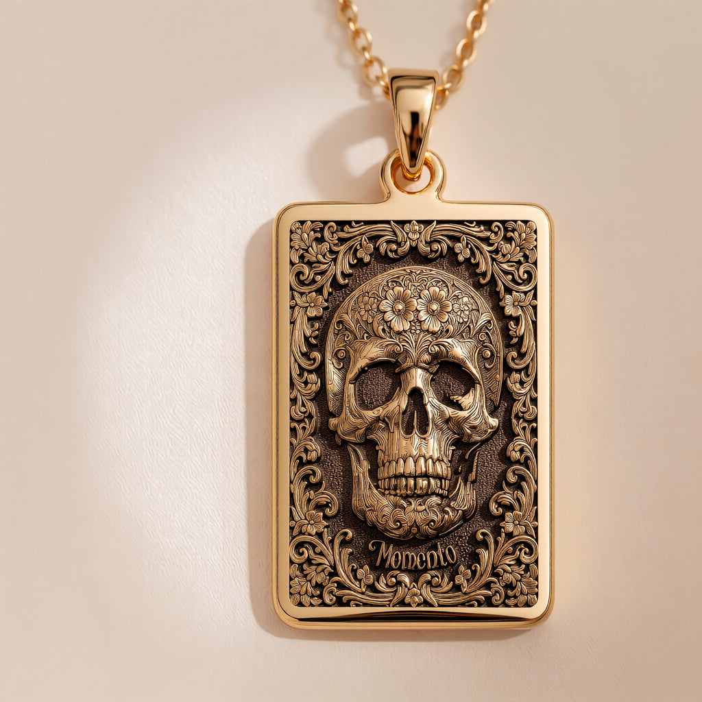Skull & Bones Memento Mori Pendant Necklaces Yellow gold skull pendant with ornate floral scrollwork design necklace