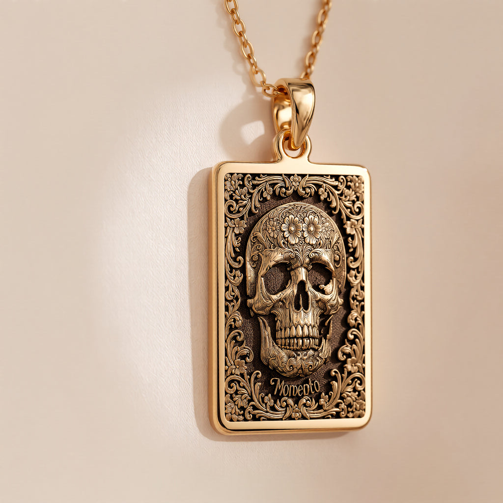 Skull & Bones Memento Mori Pendant Necklaces Yellow gold skull pendant with ornate scrollwork necklace