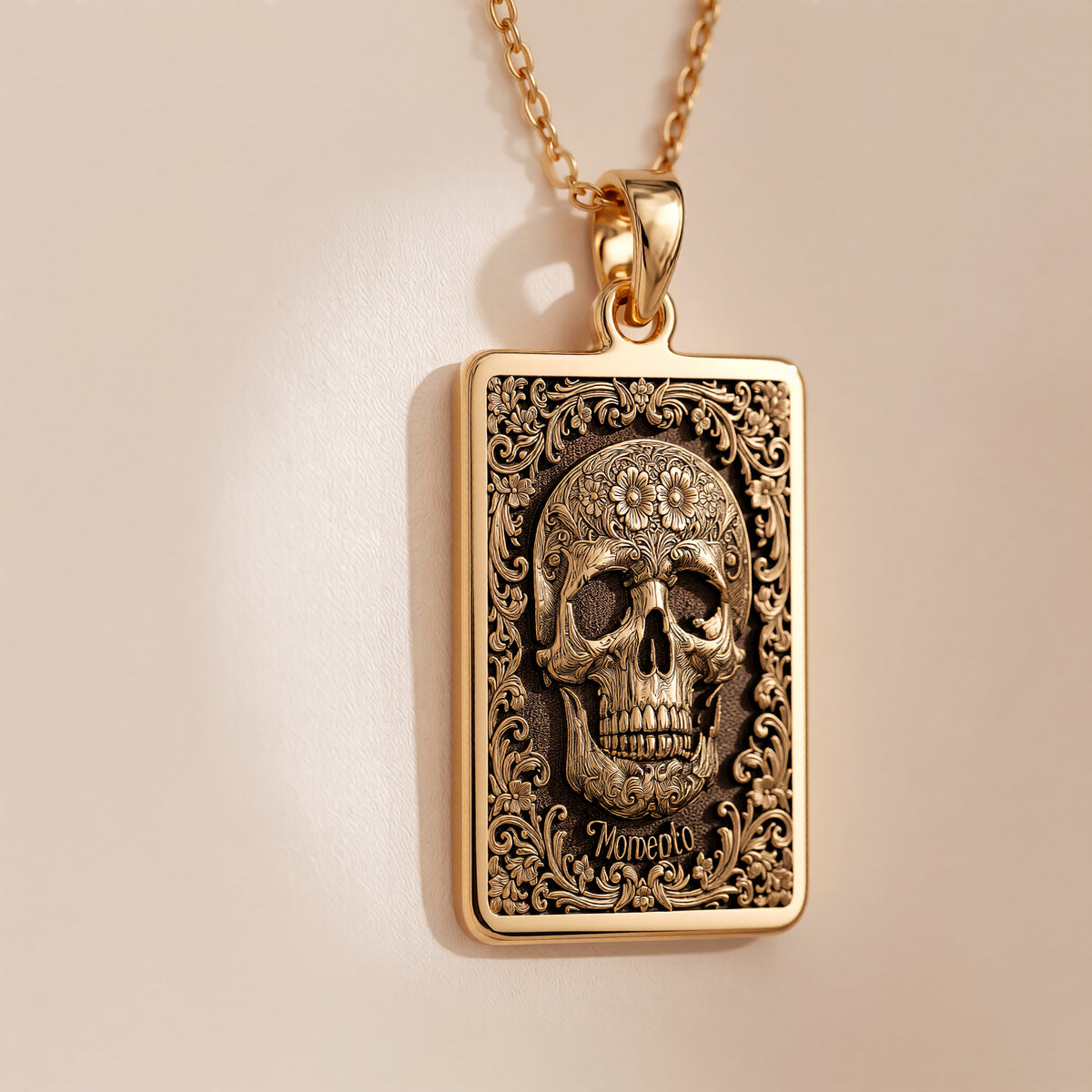 Skull & Bones Memento Mori Pendant Necklaces Yellow gold skull pendant with ornate scrollwork necklace