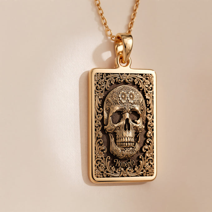 Skull & Bones Memento Mori Pendant Necklaces Yellow gold skull pendant with ornate scrollwork necklace