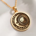 A gold necklace with a round pendant featuring a celestial sun and moon design. The intricate details symbolize harmony and cosmic balance, making it a perfect accessory for lovers of unique, symbolic jewelry. Ideal for both daily wear and special.