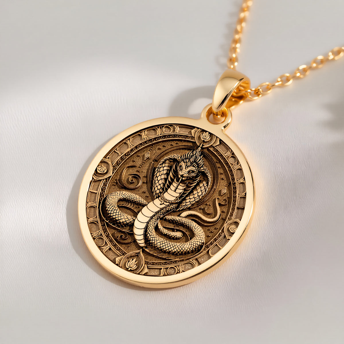 14K solid gold Naga Serpent Talisman Necklace: round  of Naga serpent deity with detail...