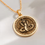 14K solid gold Naga Serpent Talisman Necklace: round  Naga serpent with detailed scales...