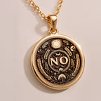 925 Sterling Silver NO Pendant with detailed boundary design. Handcrafted silver coin charm featuring empowering affirmation surrounded by protective evil eye, moon and laurel elements. Self-respect jewelry celebrating personal sovereignty.