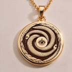 Sterling Silver Ouroboros Necklace crafted with fine details, showcasing the eternal snake symbol of rebirth and cycles. A meaningful gift or statement piece for any occasion.