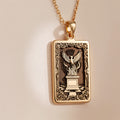 Polished 14K solid gold Phoenix Rising Rebirth charm necklace. Spiritual protection symbol jewelry for rebirth.