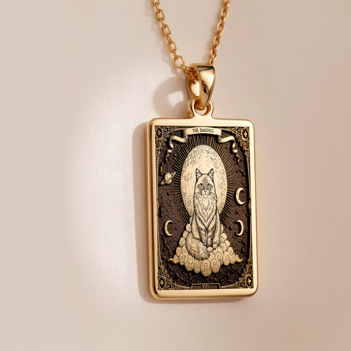 An heirloom-quality 14K solid gold Ragdoll Cat tarot pendant. The art shows the angelic cat on a cloud, symbolizing serenity, a precious cat mom gift.