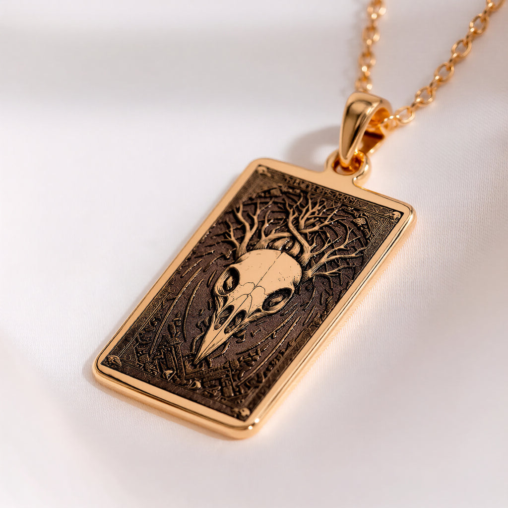Raven Skull Pendant Necklace Necklaces Yellow gold skull pendant with root design in a rectangular frame necklace