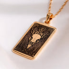 Raven Skull Pendant Necklace Necklaces Yellow gold skull pendant with root design in a rectangular frame necklace