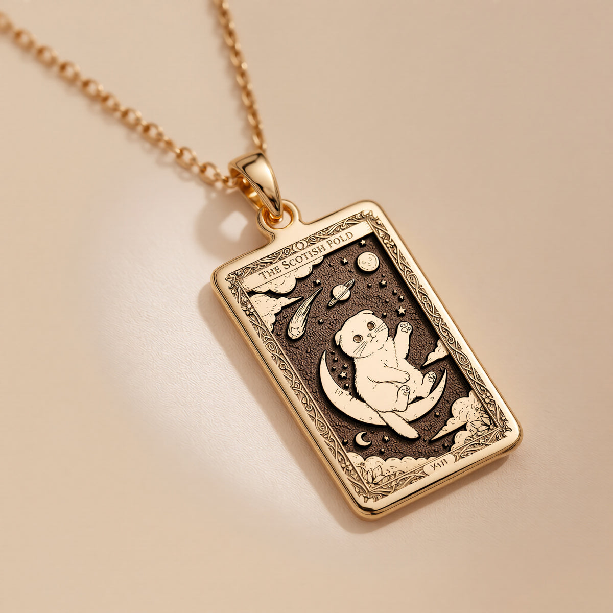 A polished 14K solid gold Scottish Fold medallion. This fine pet jewelry represents the breed's sweet spirit, making it a perfect cat lover gift.
