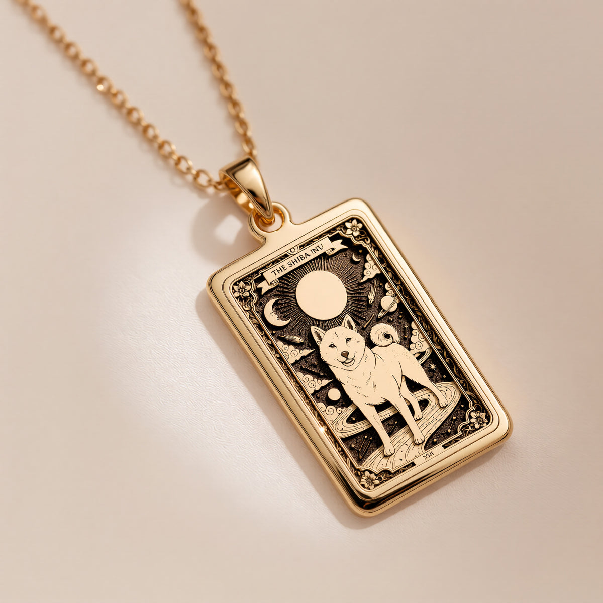 An heirloom-quality 14K solid gold Shiba Inu tarot pendant. The art shows the spirited dog under the moon, symbolizing confidence, a precious dog mom gift.