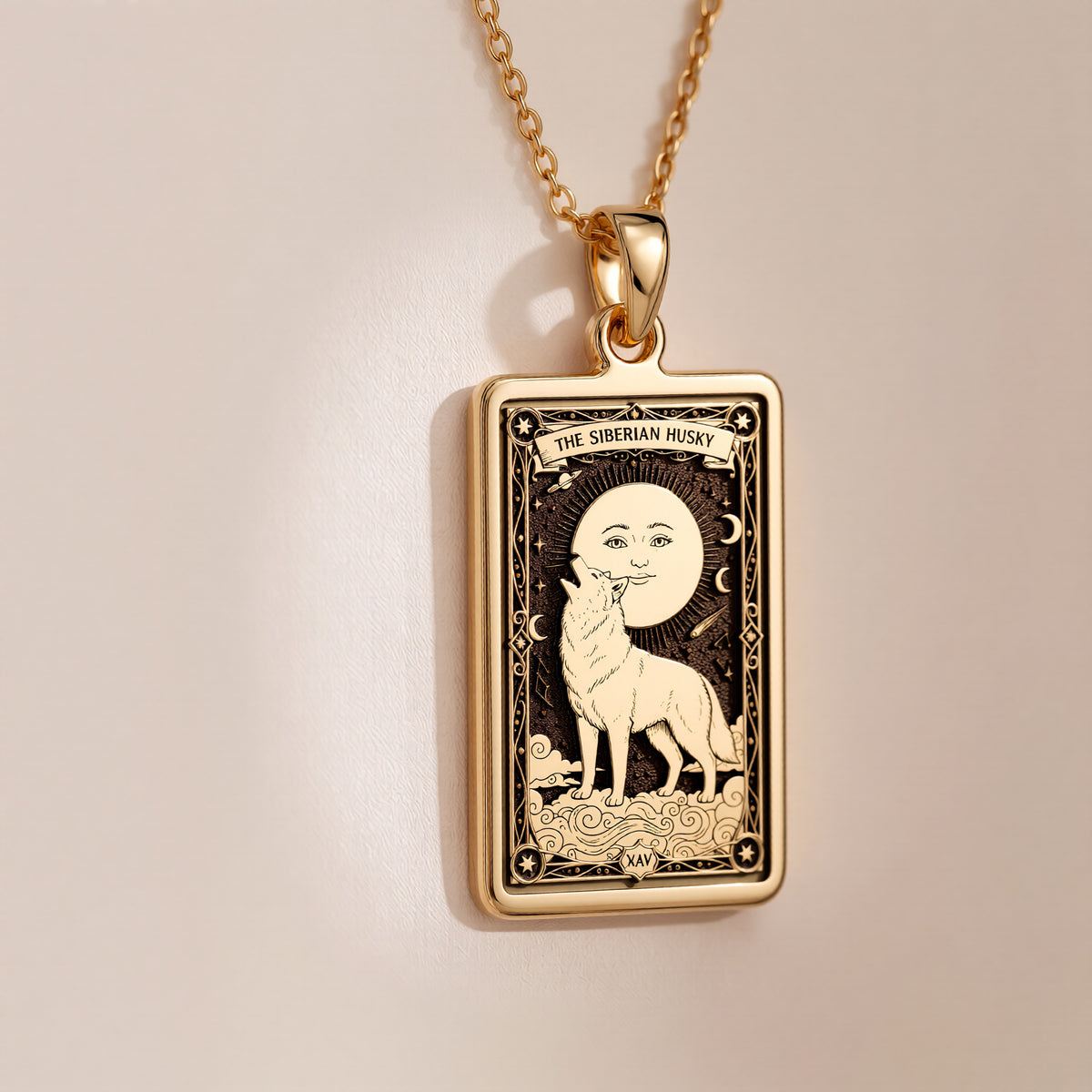 A polished 14K solid gold Siberian Husky medallion. This fine pet jewelry represents the breed's wolf-like nature, making it a perfect Husky lover gift.